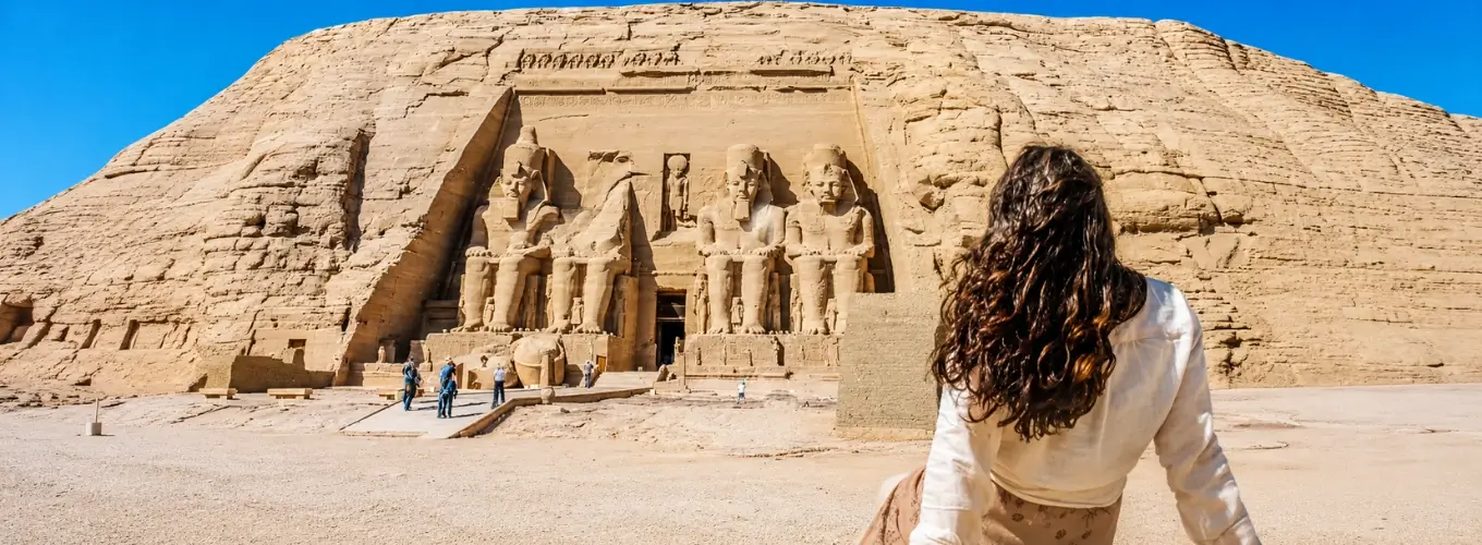 Traveler admiring the colossal Abu Simbel temples during the best time to visit Egypt